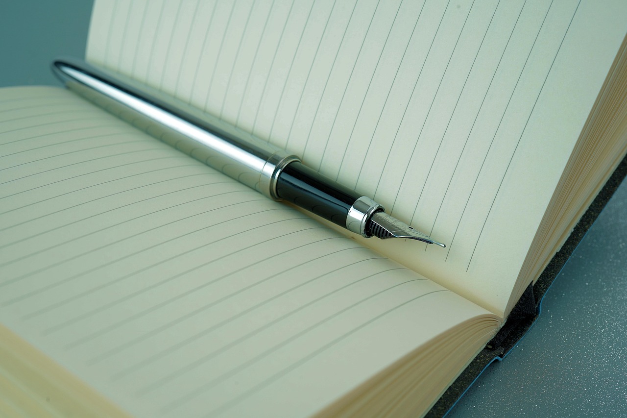 open notebook pen